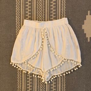 White Pom Pom cover up shorts from Greece